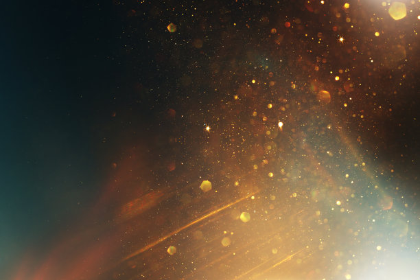 背景的抽象金和黑色闪光灯。散焦图片下载