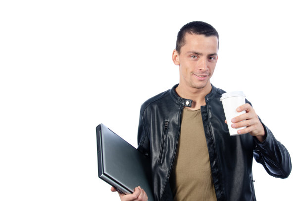 带着笔记本电脑的性感男人。白色背景。图片下载