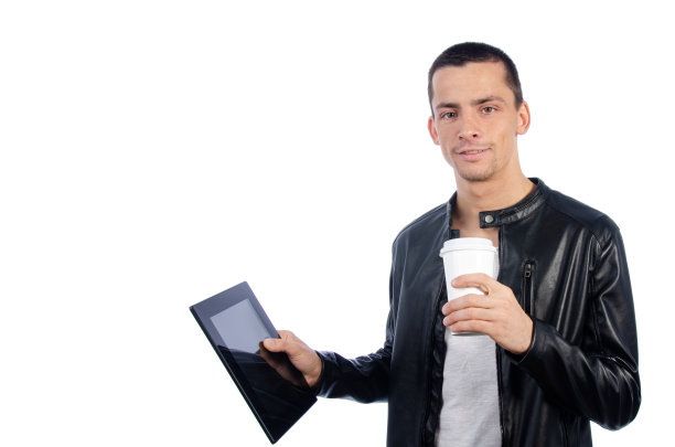 带着笔记本电脑的性感男人。白色背景。图片下载