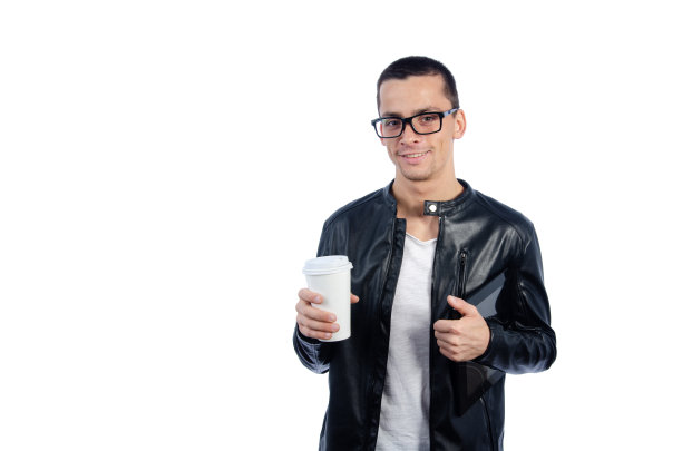 带着笔记本电脑的性感男人。白色背景。图片下载