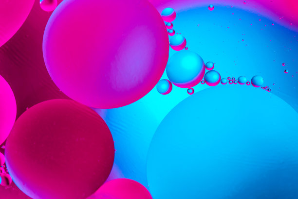 美丽的颜色抽象背景水和油混合。彩色的抽象。蓝色和粉红色的背景。图片下载