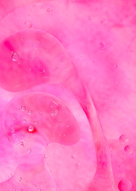 照片上的油与气泡水面。柔软的粉红色。抽象的彩色背景。宏观特写，不是插图图片下载