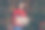 照片正面漂亮成熟的女人穿红色毛衣微笑着拿着新年装饰品在室内的家房间图片下载