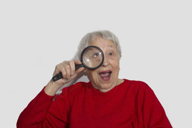 妇女的肖像，透过放大镜在白色图片下载