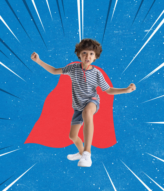 当代艺术拼贴小男孩穿着红色斗篷假装超人孤立在蓝色背景图片下载
