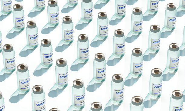 瓶装COVID-19疫苗。图片下载