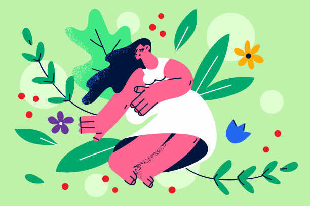 幸福的女人坐在花丛中感到平静图片下载