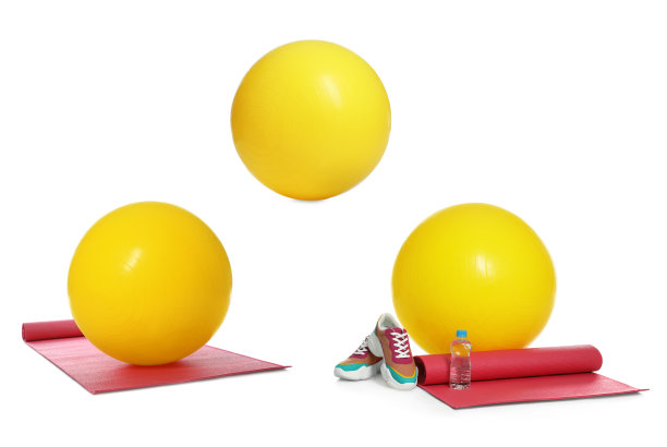 一套健身球和其他运动配件在白色的背景图片下载