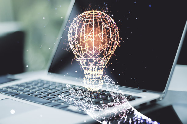 创意灯泡插图在现代计算机的背景，未来的技术概念。Multiexposure图片下载