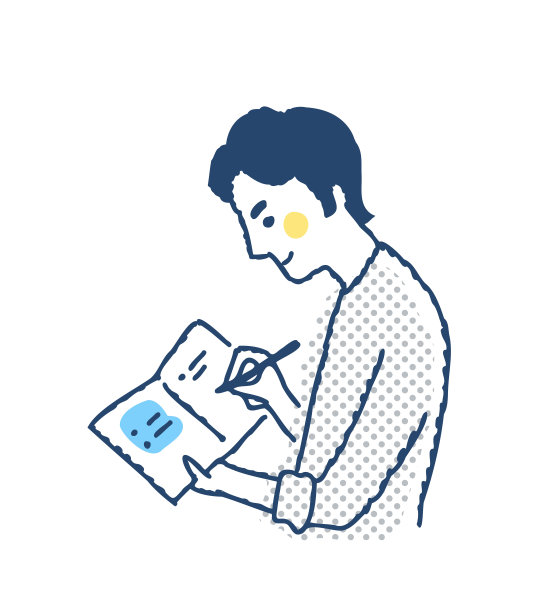 一个男人在笔记本上做笔记图片下载