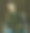 工作室拍摄的美丽的年轻女子穿着休闲服装坐在一个大舒适的椅子，看着相机图片下载