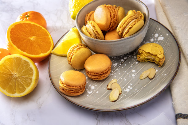 柑橘马卡龙饼干甜糕点与橘子和柠檬股票照片图片下载
