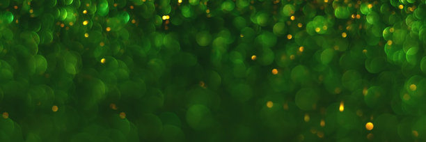 绿色和金色闪光散景背景横幅图片下载