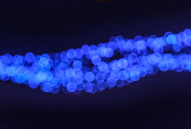 蓝圆模糊的焦斑灯黑点上图片下载