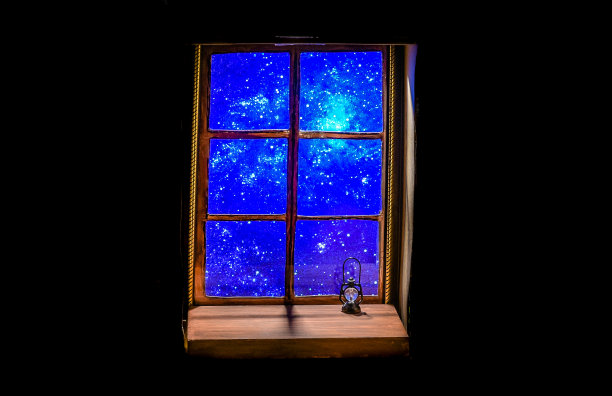 夜晚窗外星空的背景灯图片下载