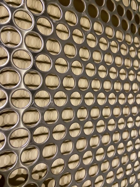 银色金属孔图案背景图片下载