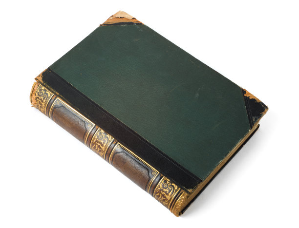 古色古香的书与金色华丽在白色的背景。图片下载