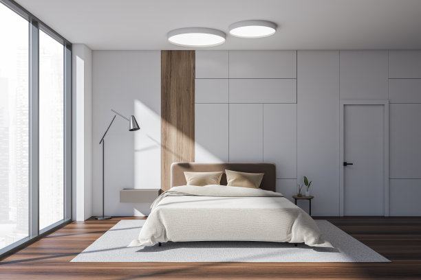 白色的卧室内饰，床铺在拼花地板上，窗户和门图片下载