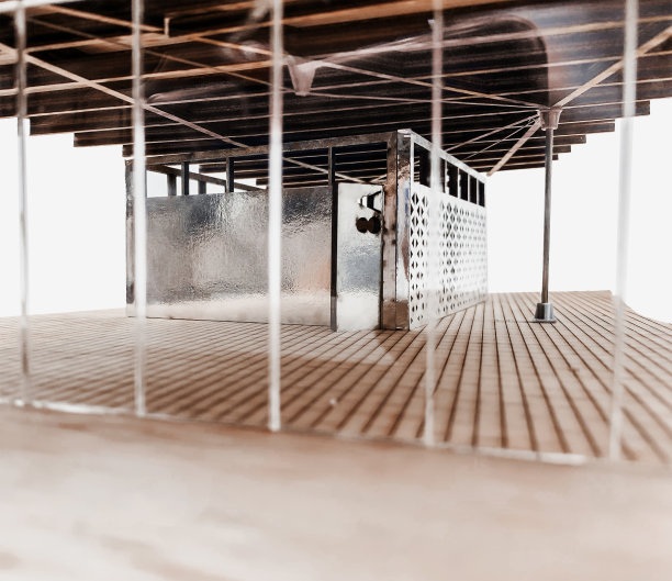 用激光切割胶合板和纸板制作的教室建筑物理模型。反射立面是穿孔的参数三角形自然图案。图片下载