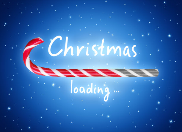 圣诞装棒在糖果的甘蔗形式，新年甜薄荷棒显示进展在蓝色闪光的背景和题词，圣诞假日概念设计与棒棒糖。图片下载