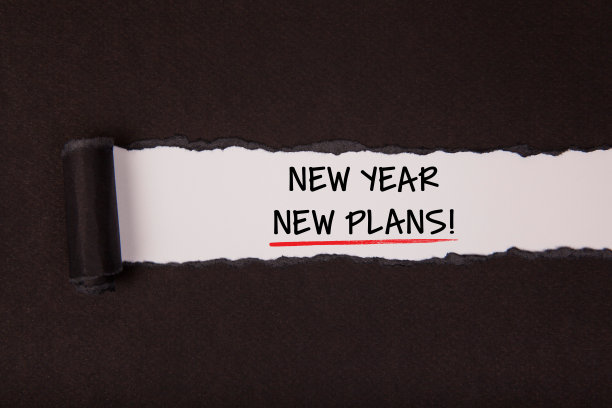 在白色背景上的新年新计划的撕纸图片下载