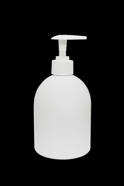 白色液体肥皂瓶与泵隔离在黑色图片下载