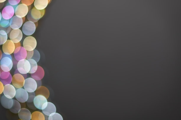 模糊的多色灯在灰色背景与复制空间图片下载