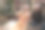 在公司的圣诞晚会上，两名女员工正在逗一只狗。图片下载