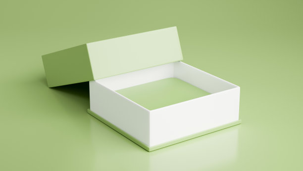 绿色和白色空礼品盒模型在柔和的绿色背景。图片下载