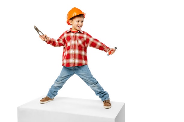 快乐的小男孩，建筑者的孩子，戴着橙色防护头盔的建筑师孤立在白色的背景上图片下载