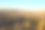 空中景观，在日落时的格里梅洞穴房子。以风景秀丽的山景为背景。状砂岩的岩石。土耳其热门旅游目的地。联合国教科文组织世界遗产图片下载