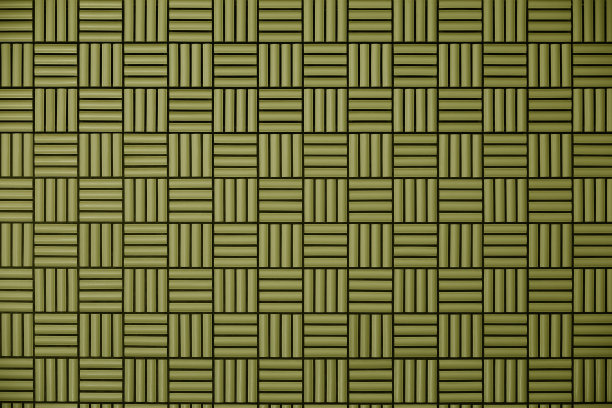 以几何图案为背景的黄色瓷砖墙图片下载