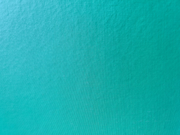 作为背景或纹理的绿蓝色硬纸板。图片下载