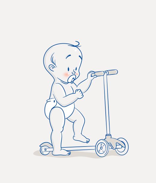 可爱的小男孩正在学习骑3轮滑板车。图片下载