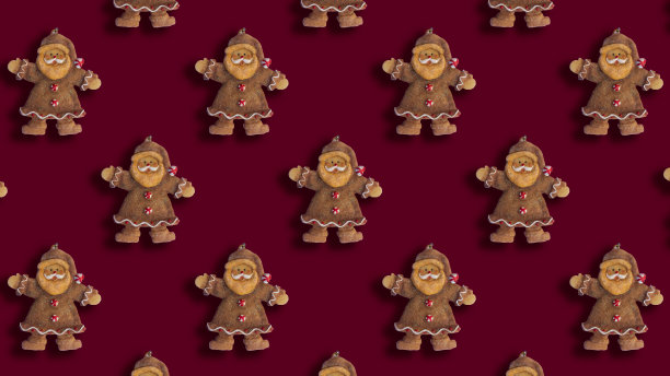 深红色背景上的圣诞老人饼干图案图片下载