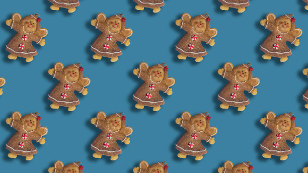 蓝色背景上的圣诞天使饼干图案图片下载