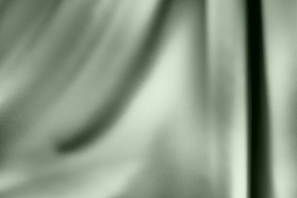波浪在窗帘上从上到下。悬挂织物与一个温和的发挥和梯度。增加微粒态背景。黑白单色照片与绿色滤镜图片下载