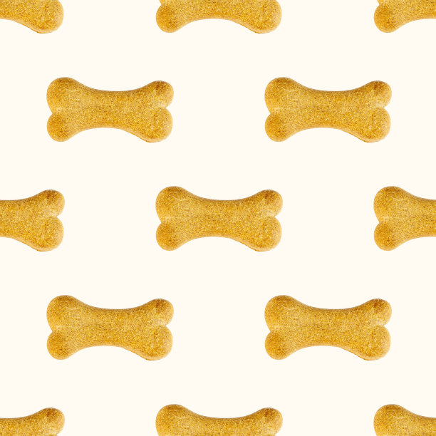 骨头形状的狗饼干重复无缝图案在浅色背景图片下载