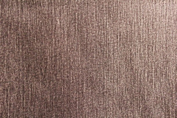 破旧的黑色牛仔裤。牛仔布。特写镜头。背景。纹理。图片下载