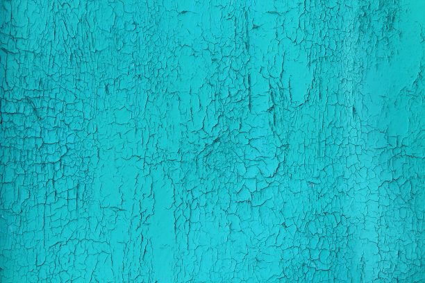 旧胶合板，蓝色油漆剥落开裂。背景。图片下载