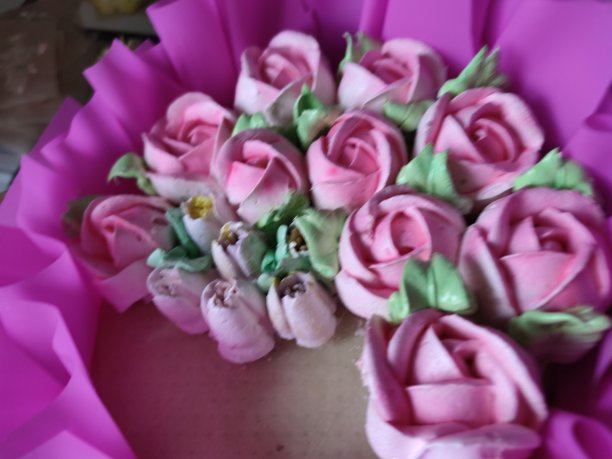 甜甜的棉花糖玫瑰。节日的甜点。图片下载