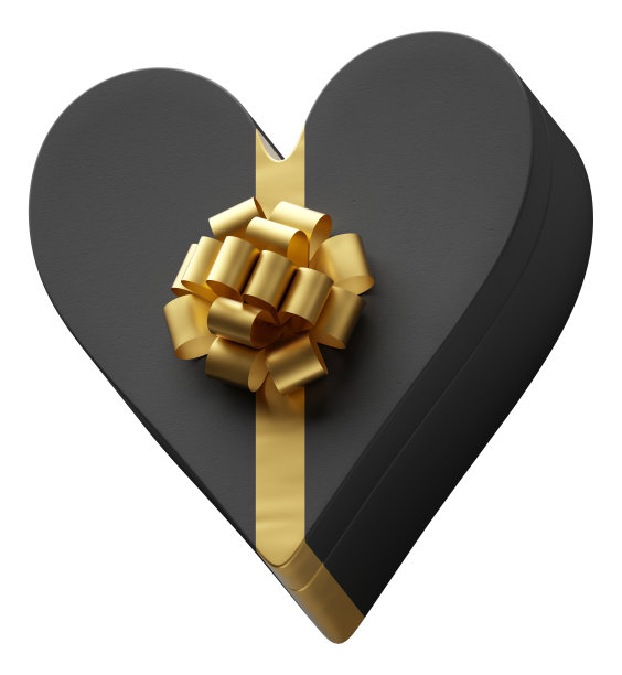 心形礼盒包装在黑暗的黑色纸与豪华金色蝴蝶结孤立在白色的背景。图片下载