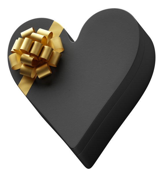心形礼盒包装在黑暗的黑色纸与豪华金色蝴蝶结孤立在白色的背景。图片下载