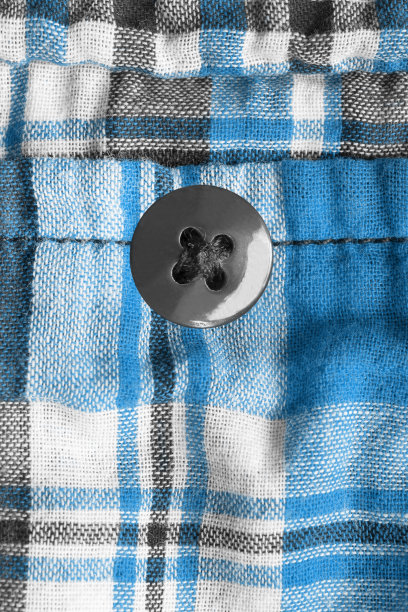 钮扣缝在织物上图片下载