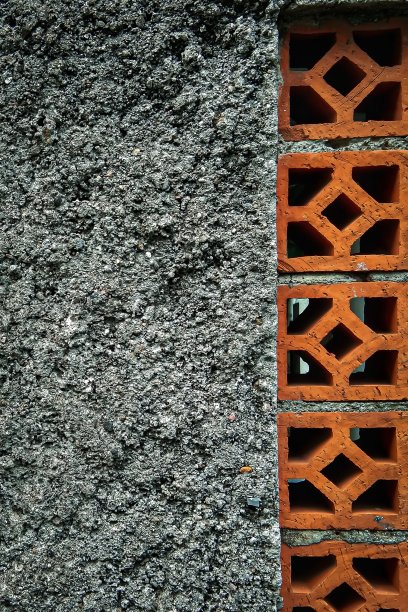 房子的墙壁纹理粗糙，用红砖通风图片下载