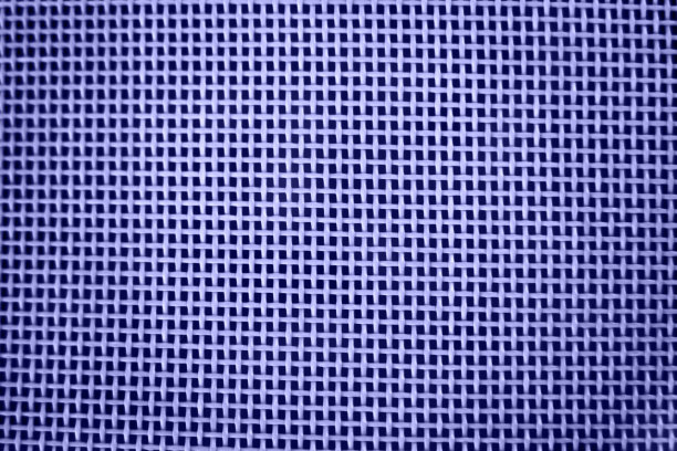 编织或网状图案背景。紫色的塑料材质图片下载