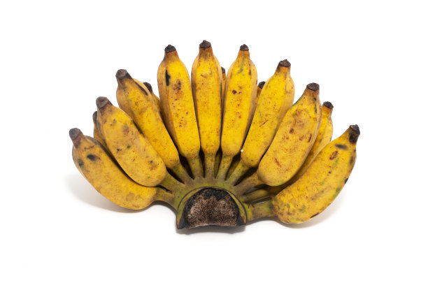 一个成熟的香蕉梳在白色的背景。图片下载