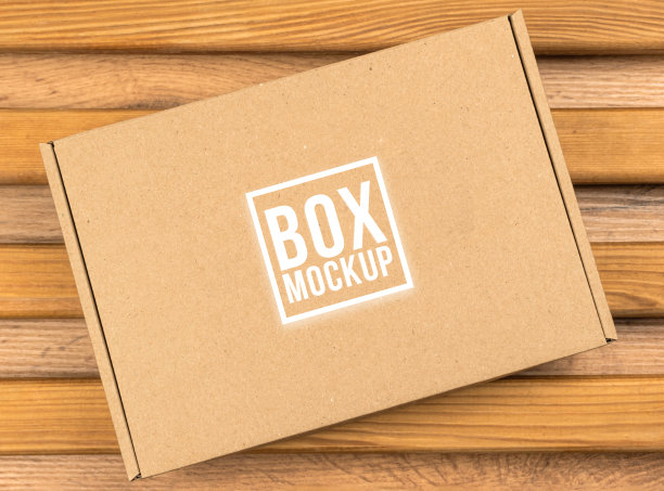 纸箱模型，俯视图。木桌，存储背景。适用于食品、化妆品或医药包装。运输和交付概念图片下载