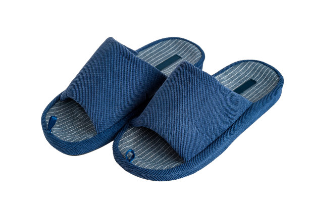 织物柔软舒适的矫形家居拖鞋，孤立在白色的背景图片下载