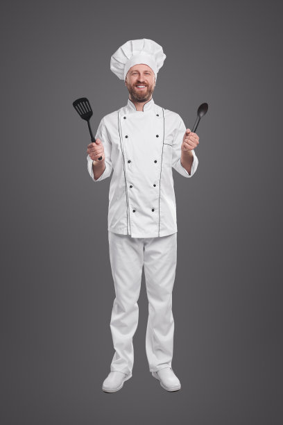 拥有厨房用具的专业厨师图片下载